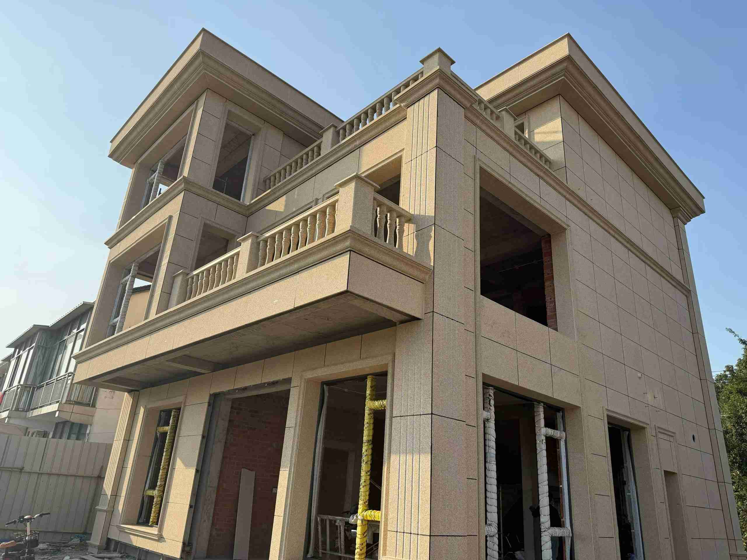 衡水 黄金麻花岗岩石材荔枝面外墙干挂效果展示